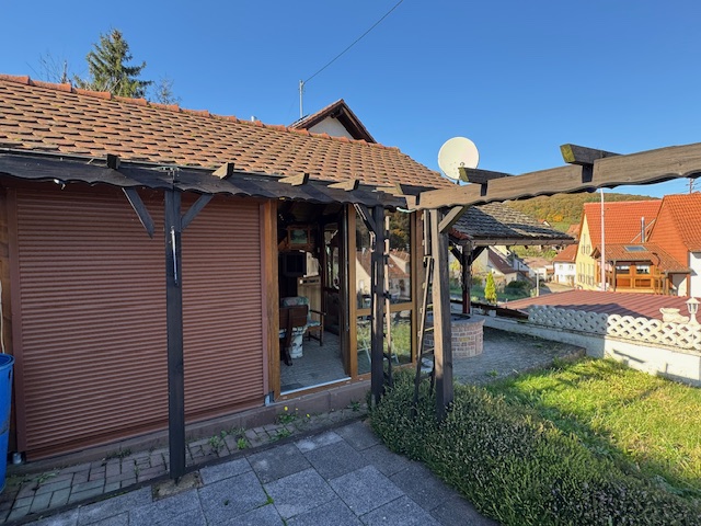 Gartenhaus mit Grillplatz